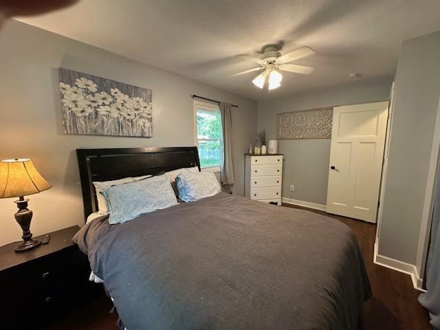 5025 Wilshire Blvd, Crystal, MN 55429 - bedroom featuring wood finished floors and ceiling fan