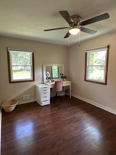 5025 Wilshire Blvd, Crystal, MN 55429 - office space featuring dark wood-style floors and a ceiling fan