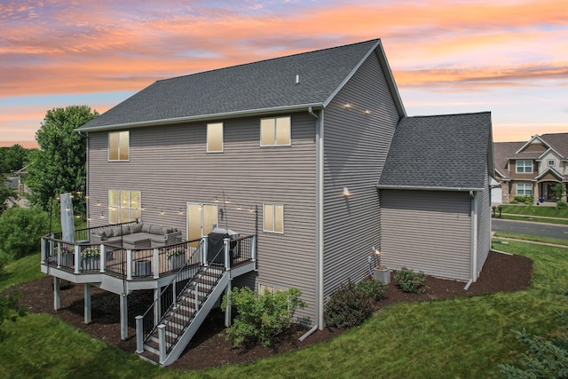 6287 Fountain Ln N, Maple Grove, MN 55311 - back of house at dusk featuring a deck, a lawn, outdoor lounge area, and roof with shingles