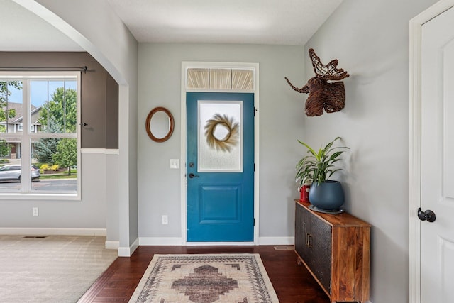 6287 Fountain Ln N, Maple Grove, MN 55311 - entrance foyer featuring arched walkways and dark wood finished floors