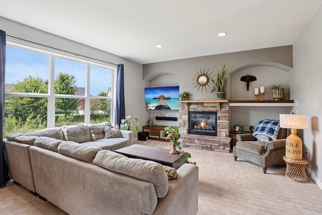 6287 Fountain Ln N, Maple Grove, MN 55311 - carpeted living room featuring a stone fireplace and recessed lighting