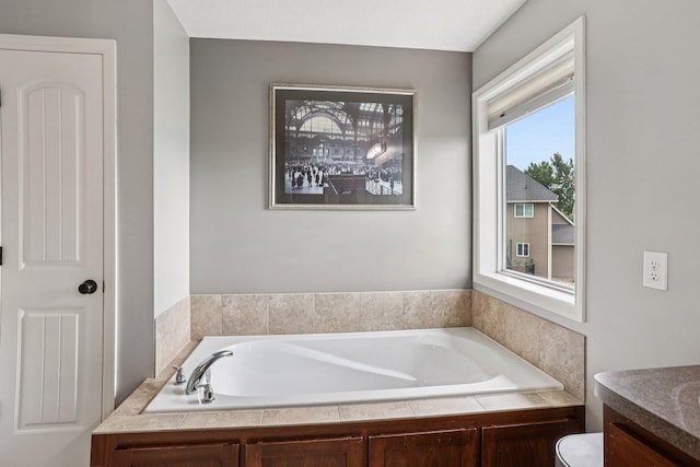 6287 Fountain Ln N, Maple Grove, MN 55311 - bathroom with a bath and vanity