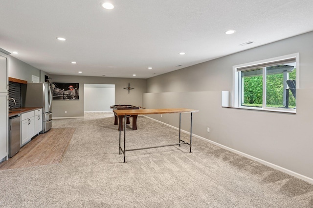 6287 Fountain Ln N, Maple Grove, MN 55311 - recreation room with light carpet and recessed lighting