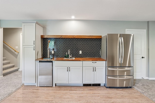 6287 Fountain Ln N, Maple Grove, MN 55311 - kitchen featuring freestanding refrigerator, wood counters, light wood-style floors, white cabinets, and recessed lighting