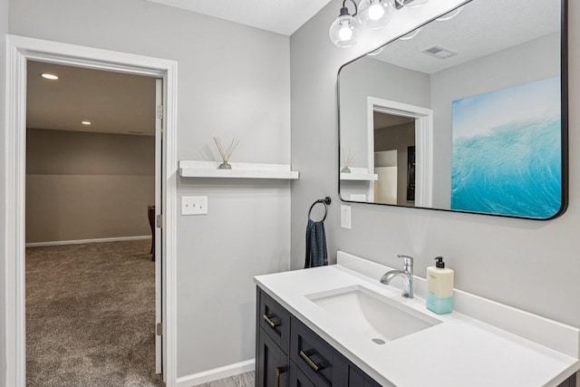 6287 Fountain Ln N, Maple Grove, MN 55311 - bathroom with vanity and baseboards