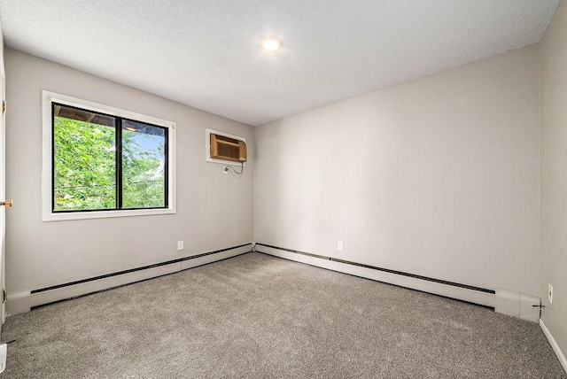 7248 72nd Ln N, Brooklyn Park, MN 55428 - empty room with a wall mounted AC, carpet floors, a baseboard heating unit, and a textured ceiling