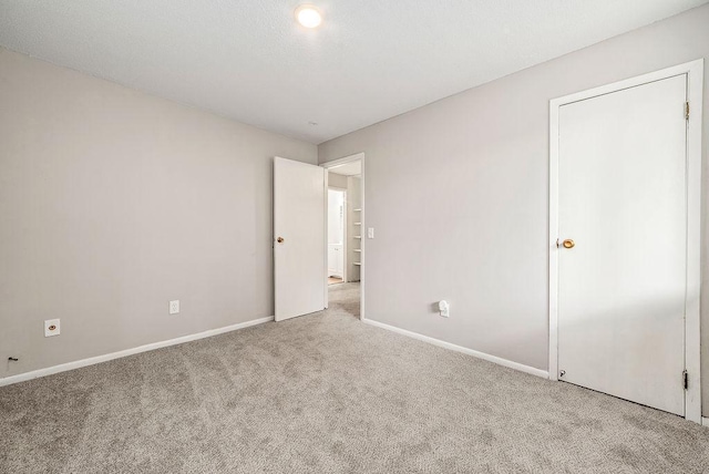 7248 72nd Ln N, Brooklyn Park, MN 55428 - unfurnished bedroom featuring carpet floors and baseboards