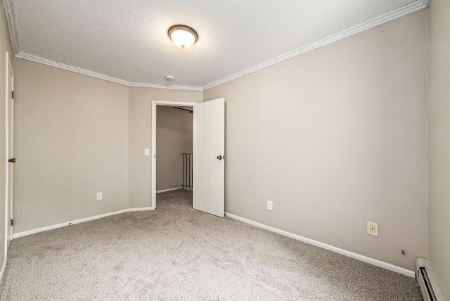 7248 72nd Ln N, Brooklyn Park, MN 55428 - carpeted spare room featuring a baseboard radiator, a textured ceiling, ornamental molding, and a smoke detector