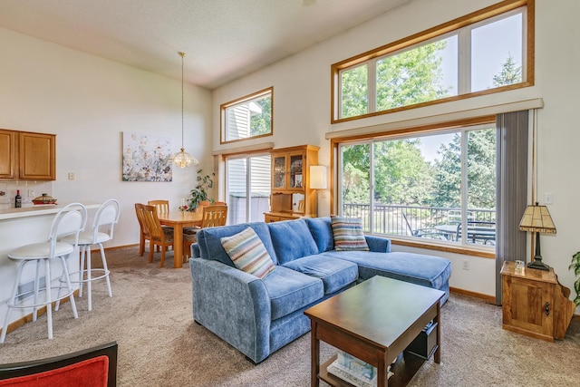 15126 Cimarron Way, Rosemount, MN 55068 - living area featuring light colored carpet and a towering ceiling