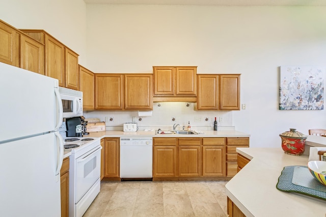15126 Cimarron Way, Rosemount, MN 55068 - kitchen featuring white appliances, a high ceiling, light countertops, and tasteful backsplash