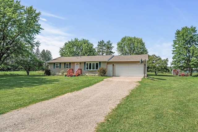 7635 165th Ave NE, Columbus, MN 55025 - ranch-style home with gravel driveway, a garage, and a front yard