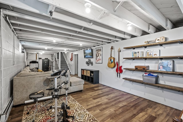 7635 165th Ave NE, Columbus, MN 55025 - exercise area with wood finished floors and a baseboard radiator