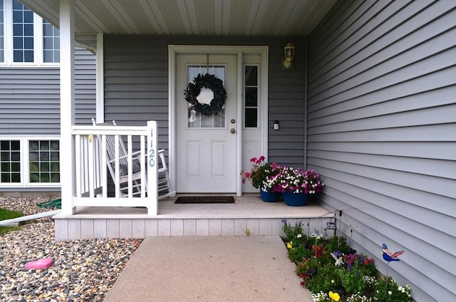 1120 Madisson St, Alexandria, MN 56308 - entrance to property with a porch