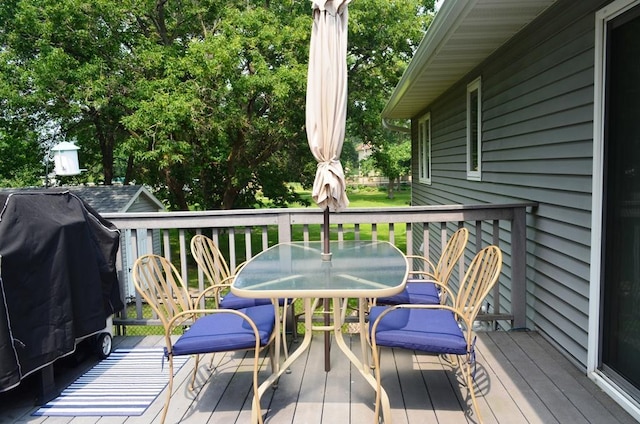 1120 Madisson St, Alexandria, MN 56308 - wooden deck with outdoor dining space