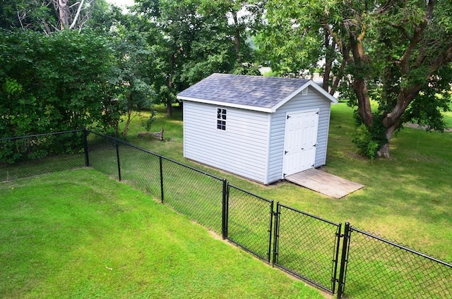 1120 Madisson St, Alexandria, MN 56308 - view of shed featuring a gate