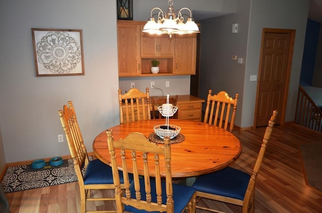 1120 Madisson St, Alexandria, MN 56308 - dining room with wood finished floors and a chandelier