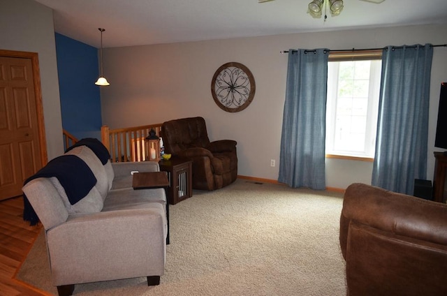 1120 Madisson St, Alexandria, MN 56308 - carpeted living area featuring ceiling fan and vaulted ceiling