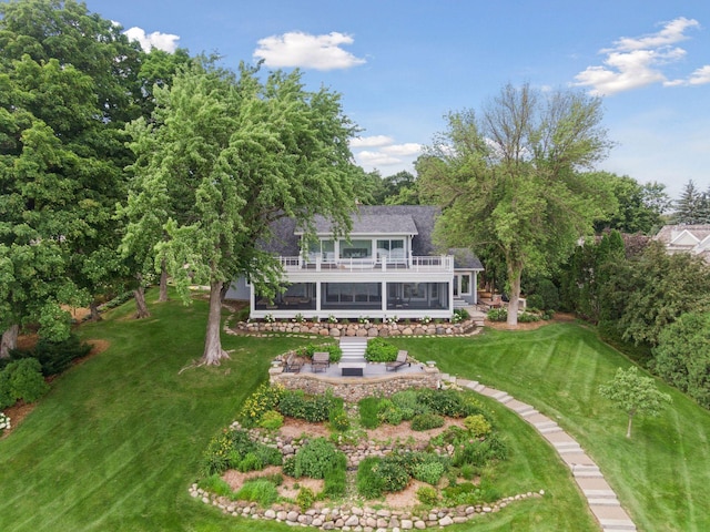 2462 Lafayette Rd, Minnetonka Beach, MN 55391 - rear view of property featuring a lawn, roof with shingles, and a patio