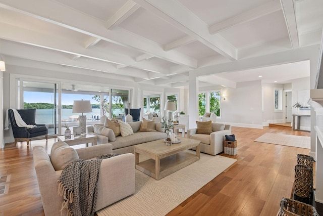 2462 Lafayette Rd, Minnetonka Beach, MN 55391 - living room featuring coffered ceiling, beam ceiling, light wood finished floors, recessed lighting, and a water view
