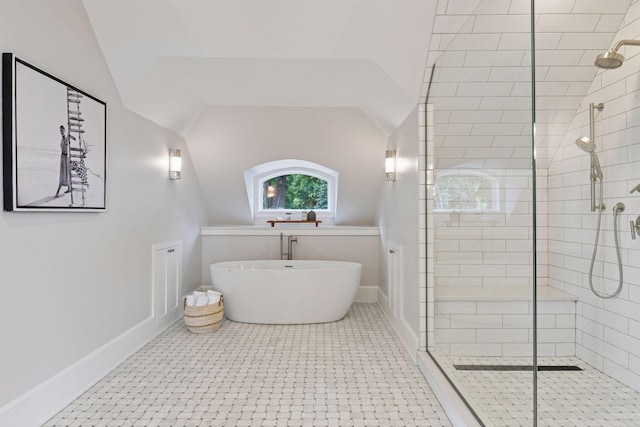 2462 Lafayette Rd, Minnetonka Beach, MN 55391 - full bathroom with a tile shower, a freestanding bath, and lofted ceiling