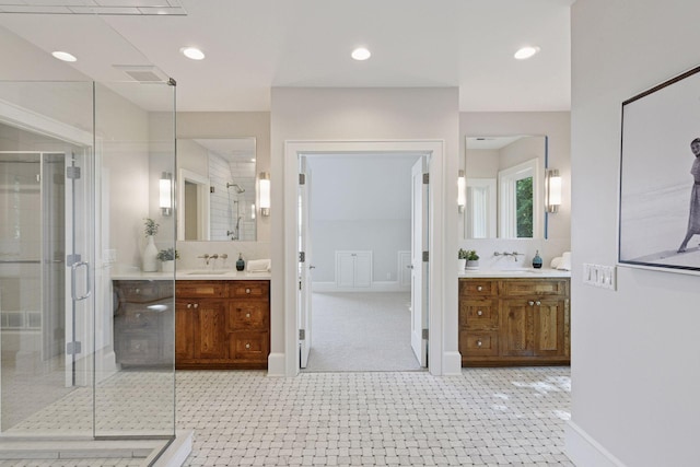 2462 Lafayette Rd, Minnetonka Beach, MN 55391 - full bath with two vanities, a stall shower, and recessed lighting