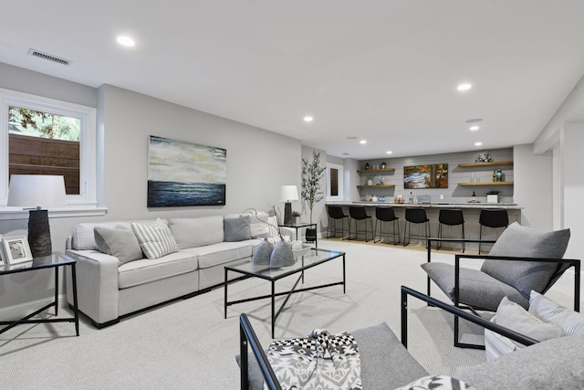 2462 Lafayette Rd, Minnetonka Beach, MN 55391 - living area featuring bar with sink and recessed lighting