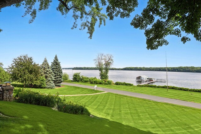 2462 Lafayette Rd, Minnetonka Beach, MN 55391 - view of community with a lawn, a dock, a water view, and boat lift