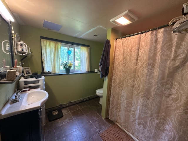 402 Grouse St, Sandstone, MN 55072 - bathroom with vanity, tile patterned floors, and a shower with shower curtain