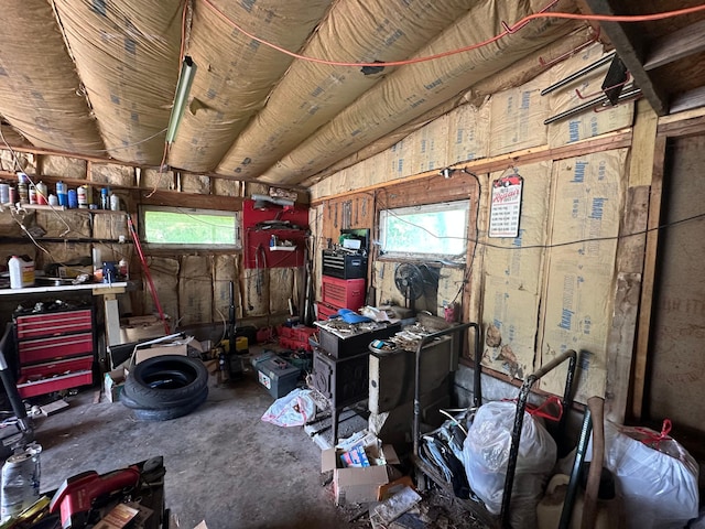 402 Grouse St, Sandstone, MN 55072 - miscellaneous room with unfinished concrete flooring and a workshop area
