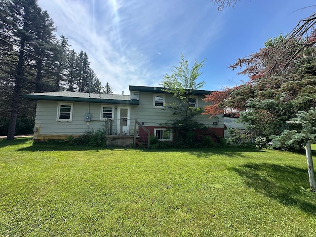 402 Grouse St, Sandstone, MN 55072 - back of property featuring a yard