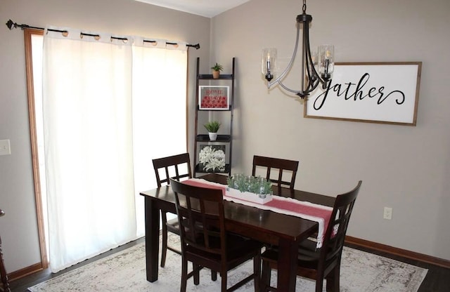 2007 Pratt Cir, Saint Peter, MN 56082 - dining room featuring a chandelier and wood finished floors