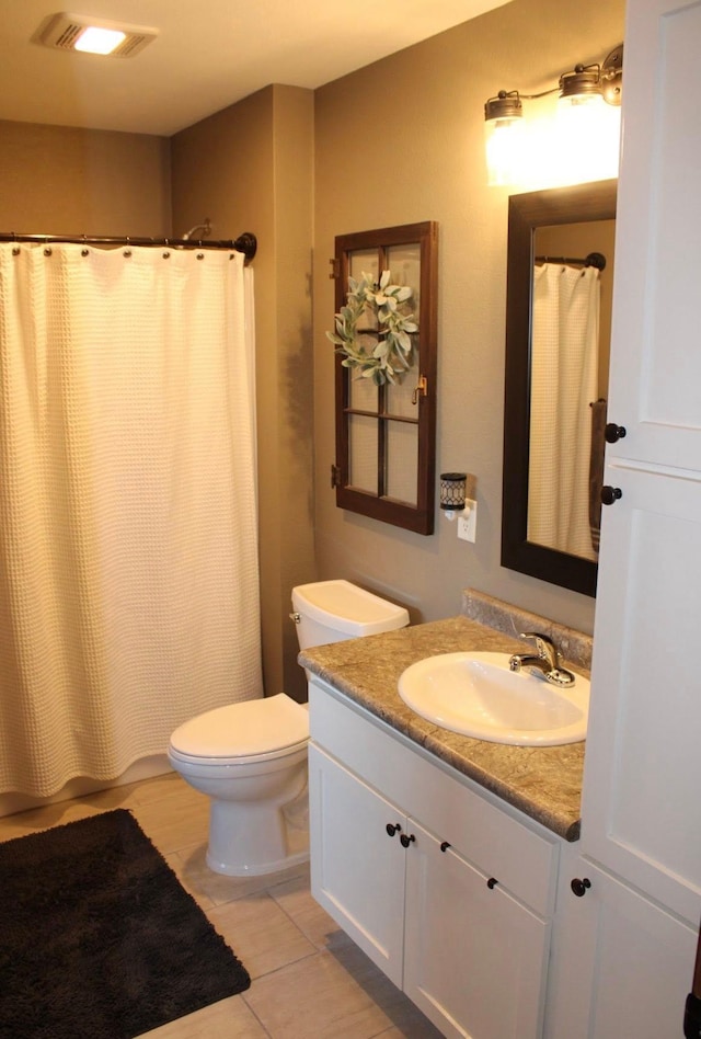 2007 Pratt Cir, Saint Peter, MN 56082 - bathroom featuring vanity, tile patterned flooring, and a shower with shower curtain