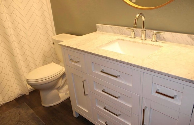 2007 Pratt Cir, Saint Peter, MN 56082 - full bath with vanity, wood finished floors, and a shower with shower curtain