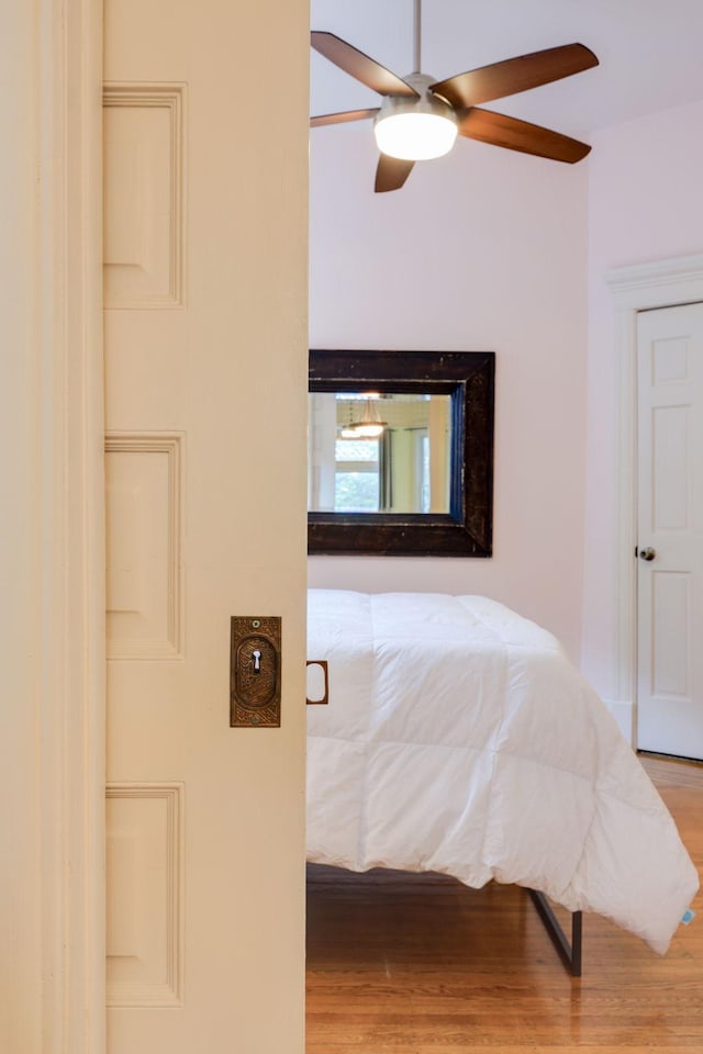 1520 Elliot Ave Unit 4, Minneapolis, MN 55404 - bedroom featuring wood finished floors and a ceiling fan