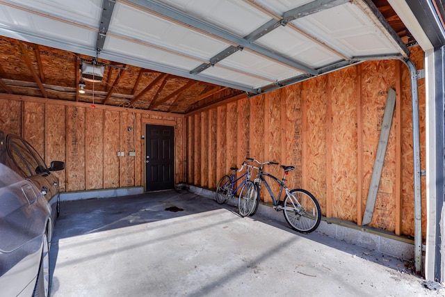 1520 Elliot Ave Unit 4, Minneapolis, MN 55404 - garage featuring a garage door opener