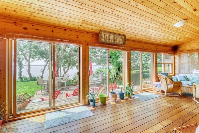 12104 County Highway 17, Lake View Twp, MN 56501 - unfurnished sunroom featuring healthy amount of natural light, wooden ceiling, wood-type flooring, and a deck with water view