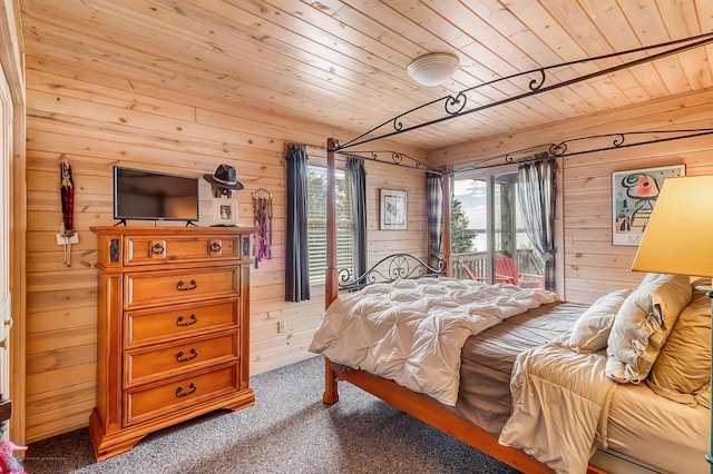 12104 County Highway 17, Lake View Twp, MN 56501 - bedroom featuring wood walls, access to exterior, carpet flooring, and wood ceiling