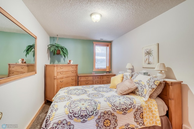 12104 County Highway 17, Lake View Twp, MN 56501 - carpeted bedroom with a textured ceiling and baseboards