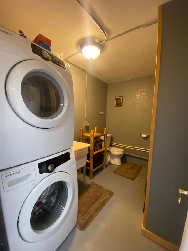 20668 County Road 41, Bremen Twp, MN 55795 - laundry room with stacked washer and clothes dryer