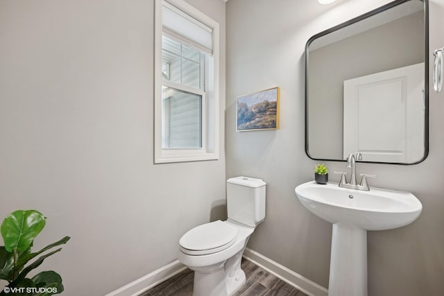 15742 Everglade Ave, Apple Valley, MN 55124 - half bathroom featuring baseboards and wood finished floors