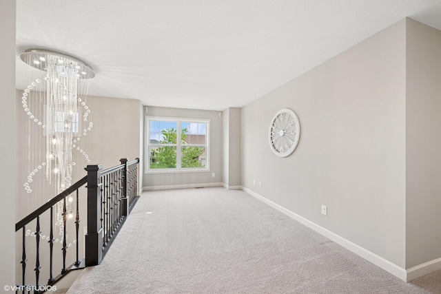 15742 Everglade Ave, Apple Valley, MN 55124 - corridor with a chandelier, carpet, and an upstairs landing