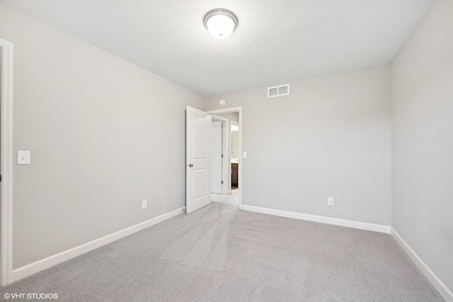 15742 Everglade Ave, Apple Valley, MN 55124 - unfurnished room with carpet and a textured ceiling