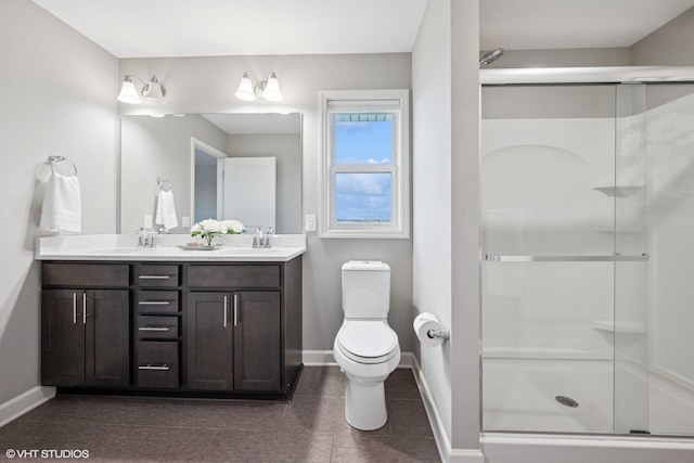15742 Everglade Ave, Apple Valley, MN 55124 - bathroom featuring double vanity, a stall shower, and tile patterned flooring