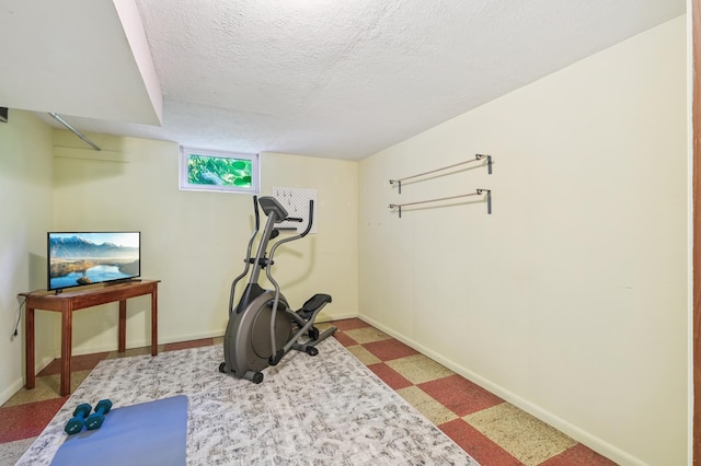 3355 Central Ave NE, Minneapolis, MN 55418 - workout area featuring light floors and a textured ceiling