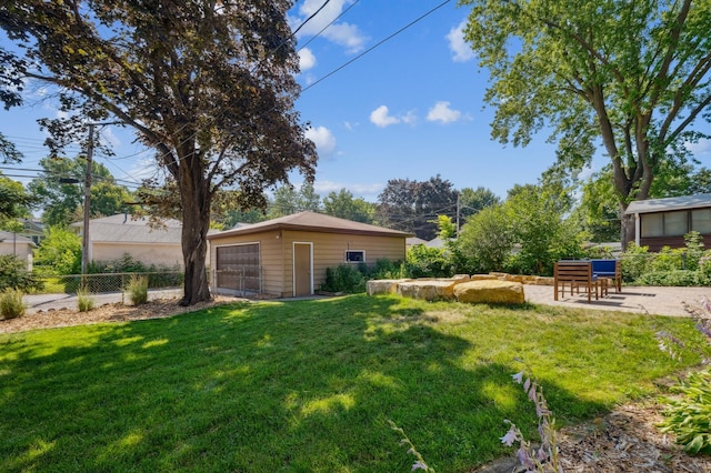 3355 Central Ave NE, Minneapolis, MN 55418 - view of yard with a patio area and an outbuilding
