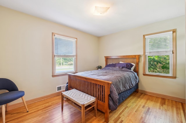 3355 Central Ave NE, Minneapolis, MN 55418 - bedroom with light wood-type flooring and baseboards