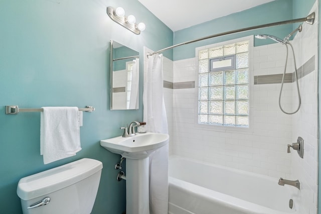 3355 Central Ave NE, Minneapolis, MN 55418 - bathroom with toilet and shower / bath combo with shower curtain