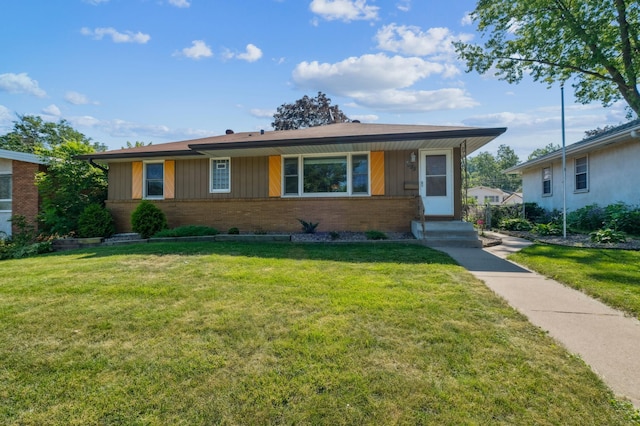 3355 Central Ave NE, Minneapolis, MN 55418 - view of front facade with brick siding and a front yard