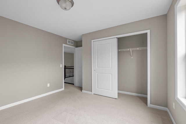 5370 Fountain Ln N, Plymouth, MN 55446 - unfurnished bedroom featuring light carpet and a closet