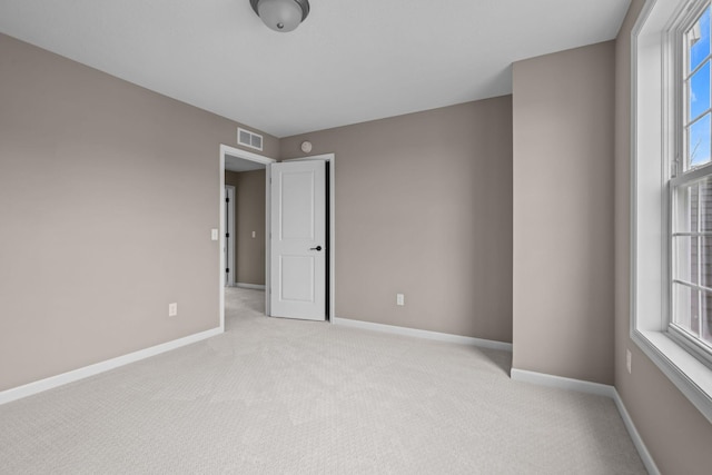 5390 Everest Ln N, Plymouth, MN 55446 - unfurnished room featuring light carpet